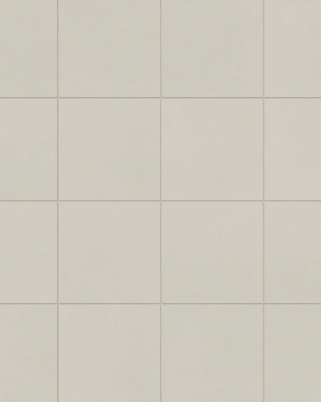 Versatile matte white porcelain tiles measuring 12x12 inches, offering a clean and timeless appearance ideal for flooring and shower pans.