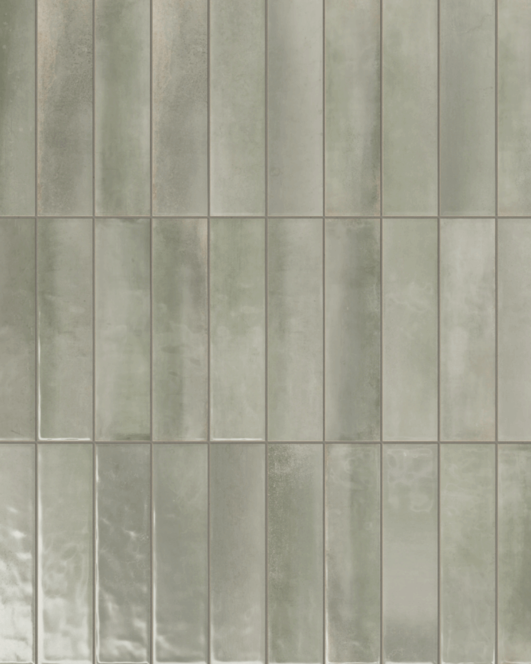 Elegant glossy ceramic tile in subtle sage green tones, sized 4x16 inches, creating a sophisticated and calming ambiance ideal for shower walls.