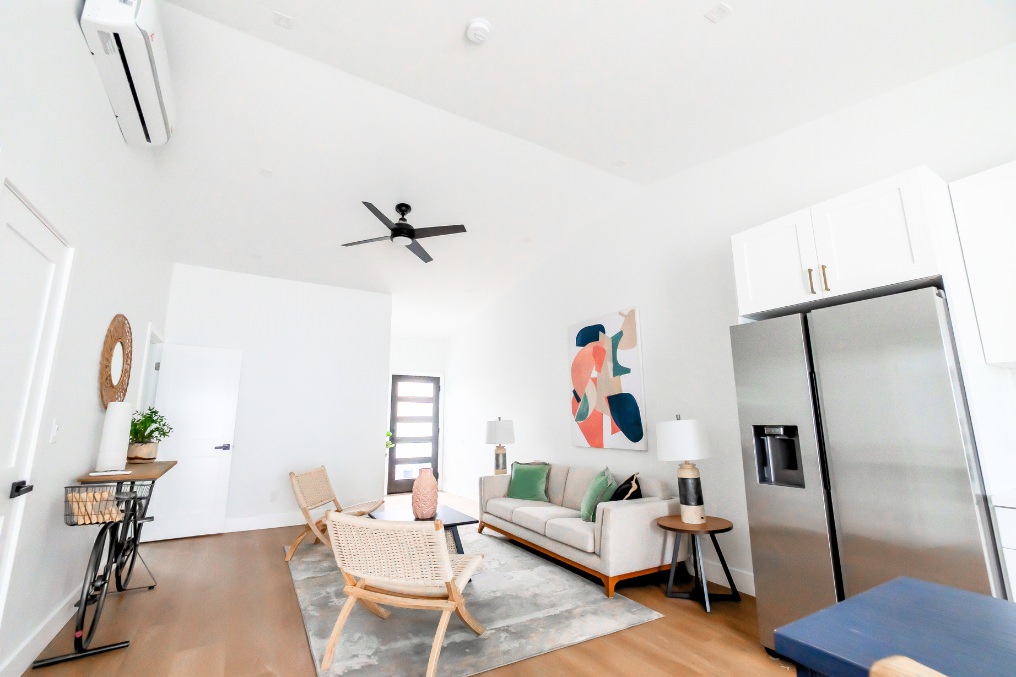 Modern living room seamlessly connected to kitchen and dining space