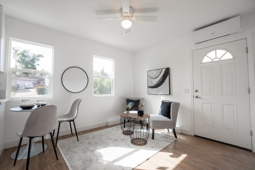 Bright and airy dining and living area with large windows in La Mesa ADU.