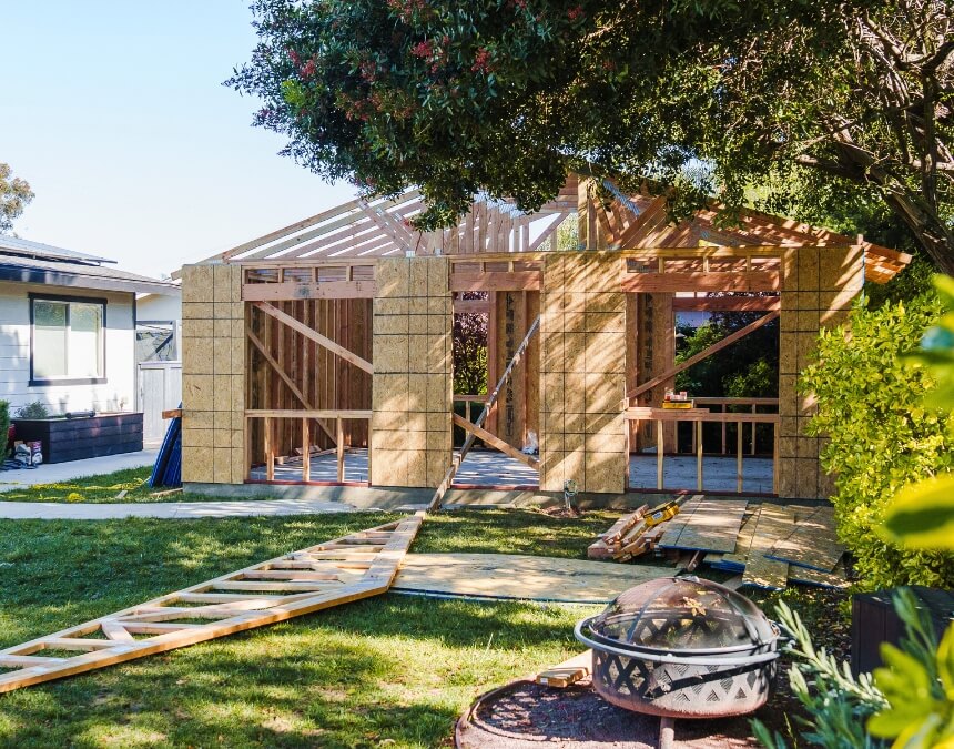 Hidden Costs Homeowners Overlook ADU structure framing backyard unit