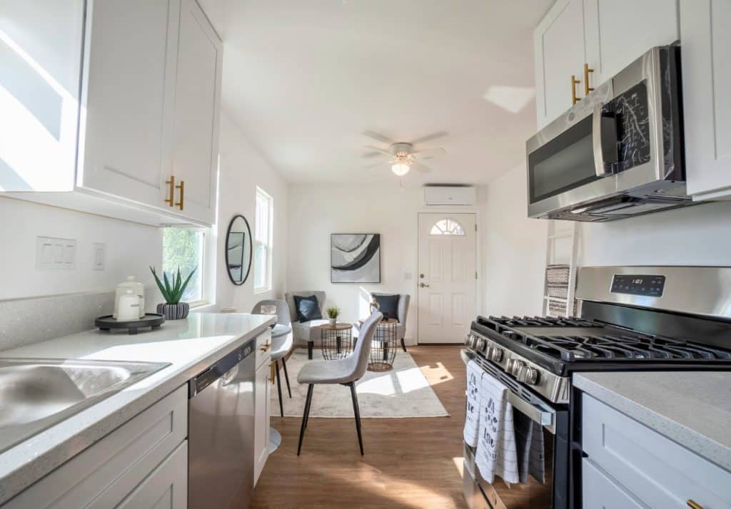 Spacious ADU living room with light-colored walls and decor for an open and inviting feel