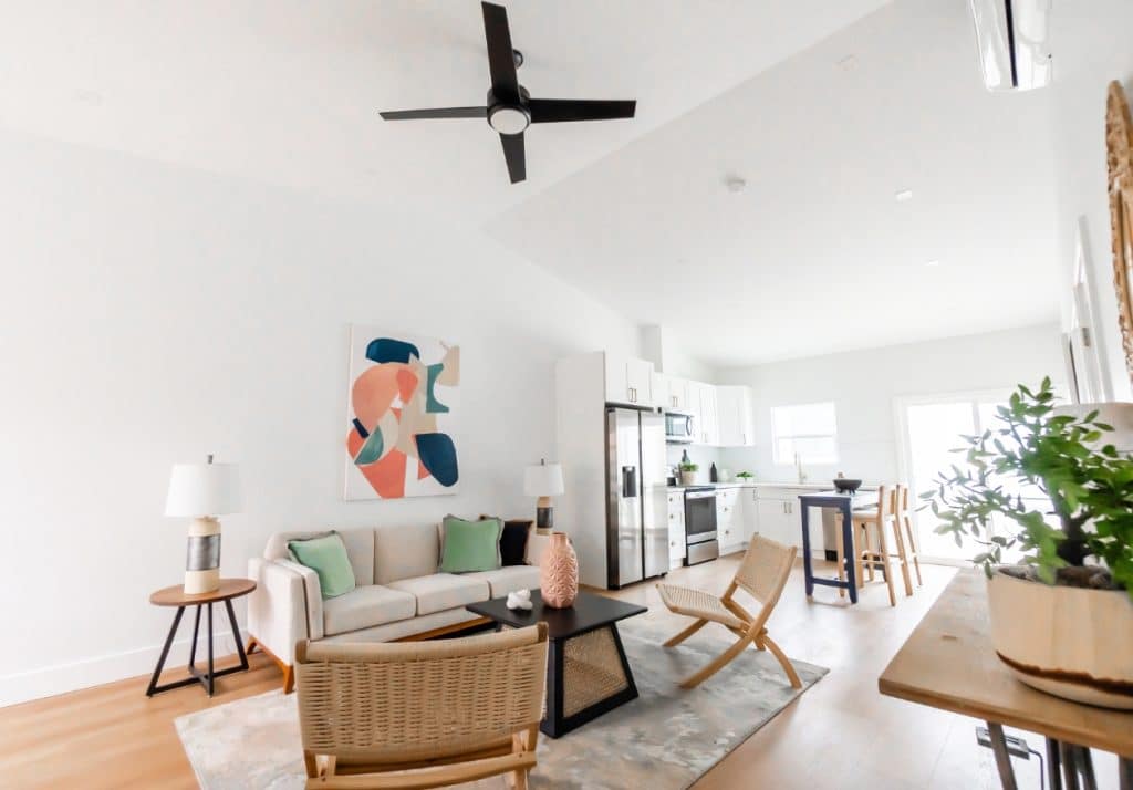 Bright, airy ADU kitchen with white cabinets and ample natural light enhancing openness