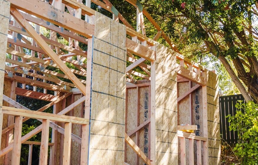 Visual representing frequently asked questions about the Cottonwood 1000 sq ft ADU floor plan, covering costs, regulations, and benefits.