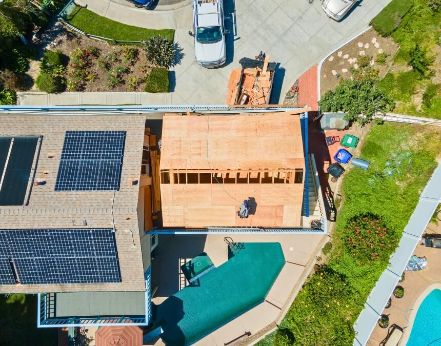 Overhead shot of ADU built beside a pool - used in "Informing Your Insurance Provider About Your ADU"
