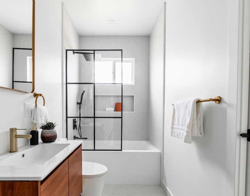 Maximizing Light and Space - bright white bathroom with modern shower and fixtures