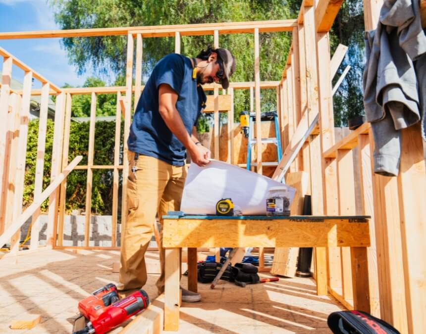 Better Place builder at ADU site checking outlet during warranty backed build