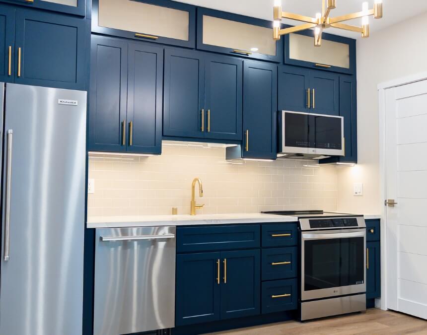 ADU Kitchen Requirements with sleek modern layout and black countertops