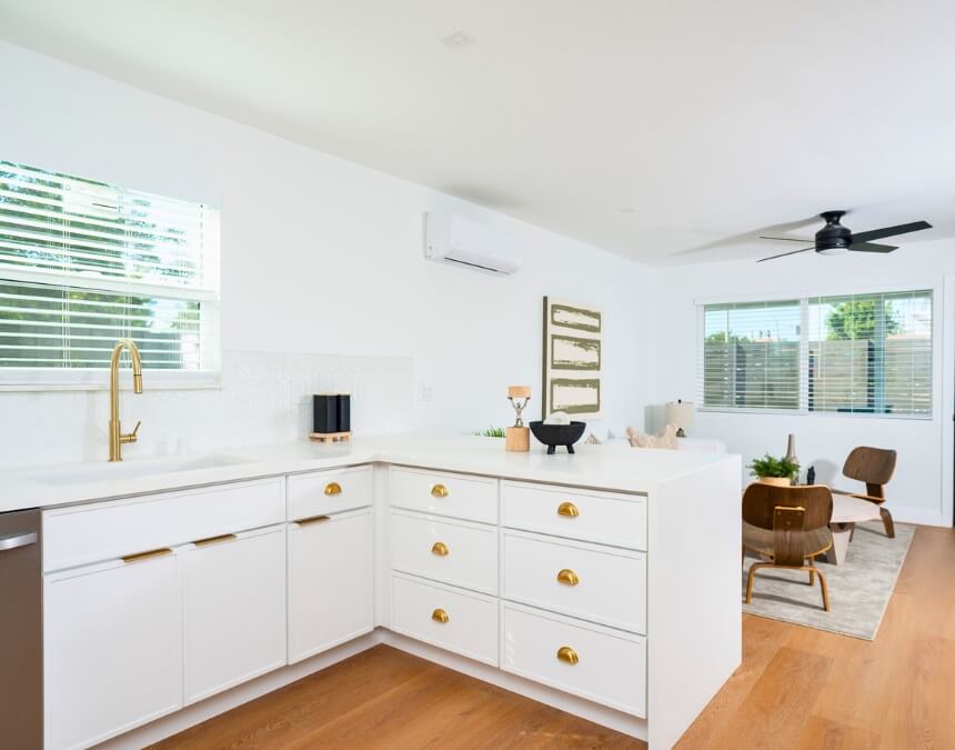 Minimalist Kitchen Layouts for Small Spaces in a bright open-concept studio