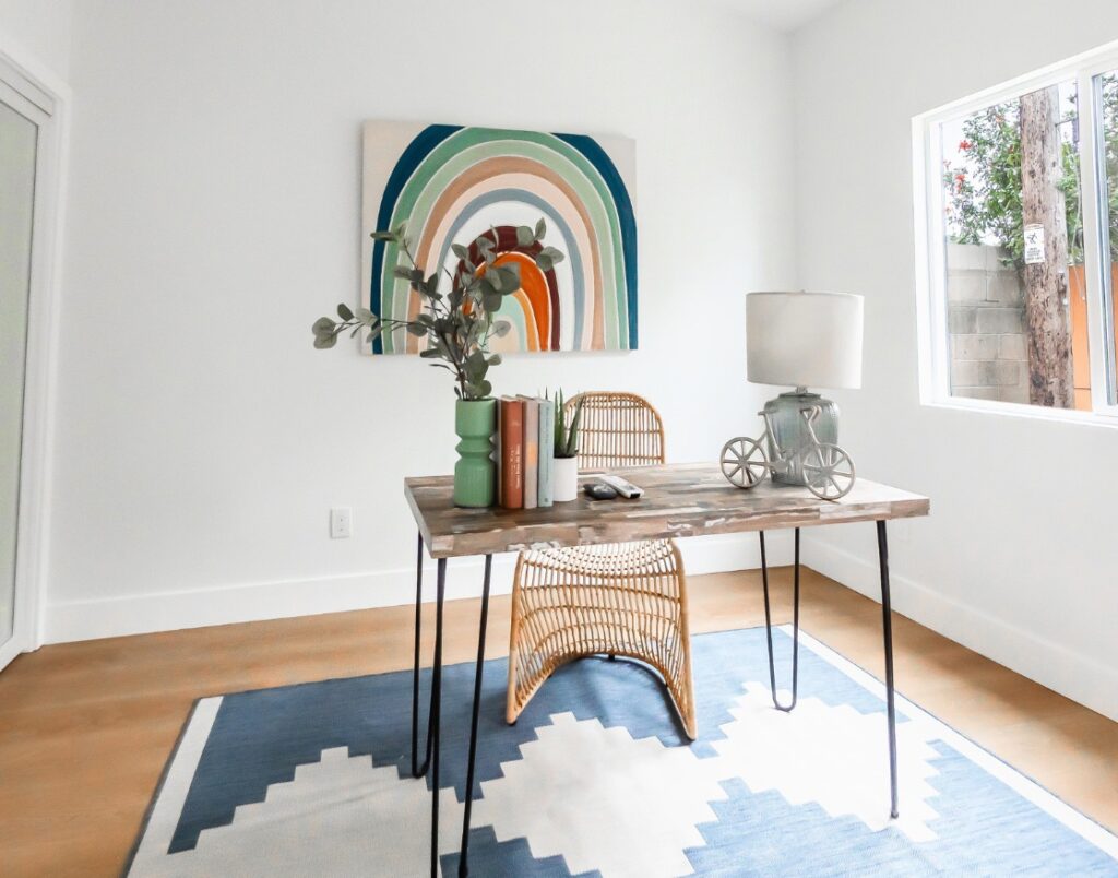 Less Stress & More Free Time featuring minimalist home office with calm decor.