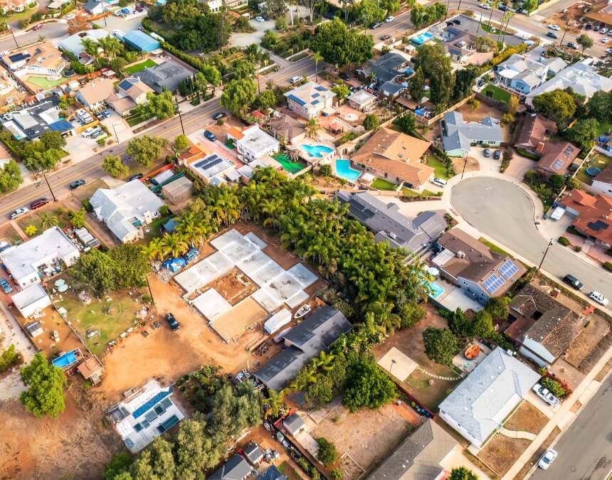 Aerial view of multiple ADU foundations laid out in a development zone.