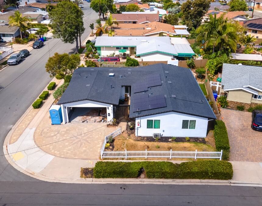 Aerial view of residential property with garage mid-conversion into an ADU
