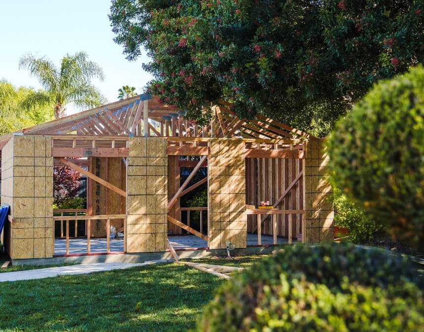 ADU exterior finished with stucco and modern entry design to harmonize with the primary residence.
