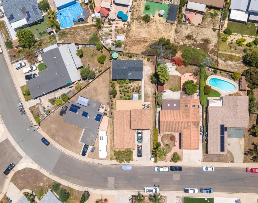 Key Components of Stormwater Management – Aerial view of residential neighborhood with ADUs and landscaping.