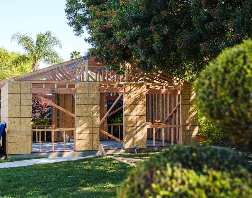Your ADU Quote Comparison Game Plan – partially framed ADU structure with roof trusses in place.