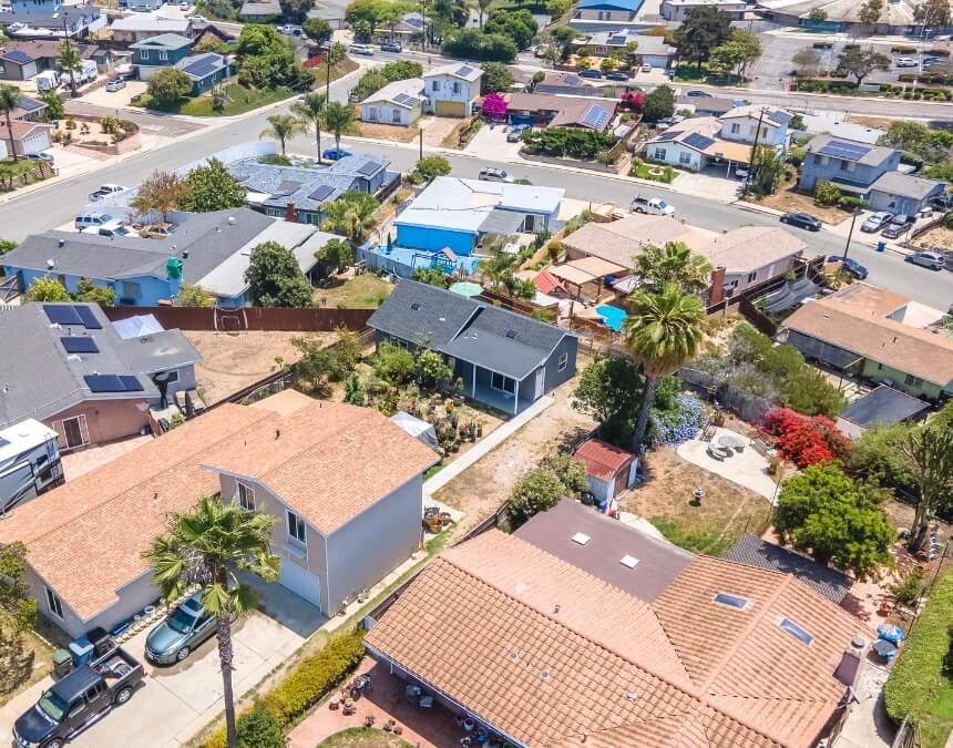 Framing of a backyard ADU with construction materials on-site — Permits, Approvals & Regulations for California Homeowners visual.
