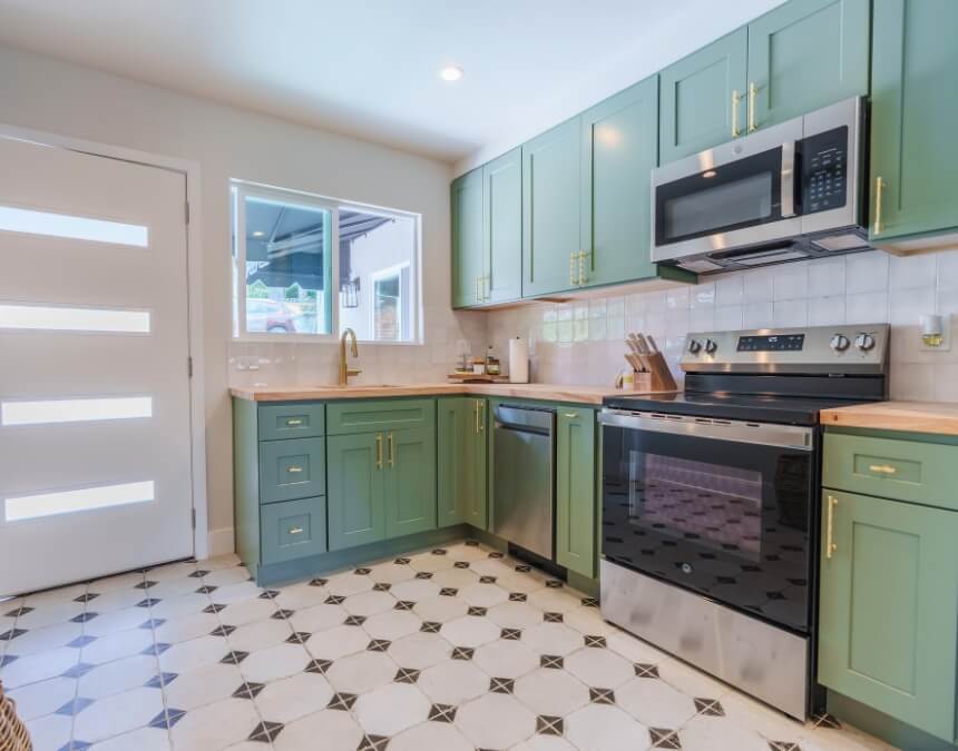 ADU kitchen interior showcasing efficient water, electric, and gas utility connections.