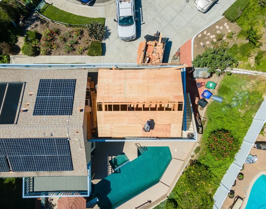 Aerial view of ADU construction illustrating proper placement and setbacks on a residential lot.
