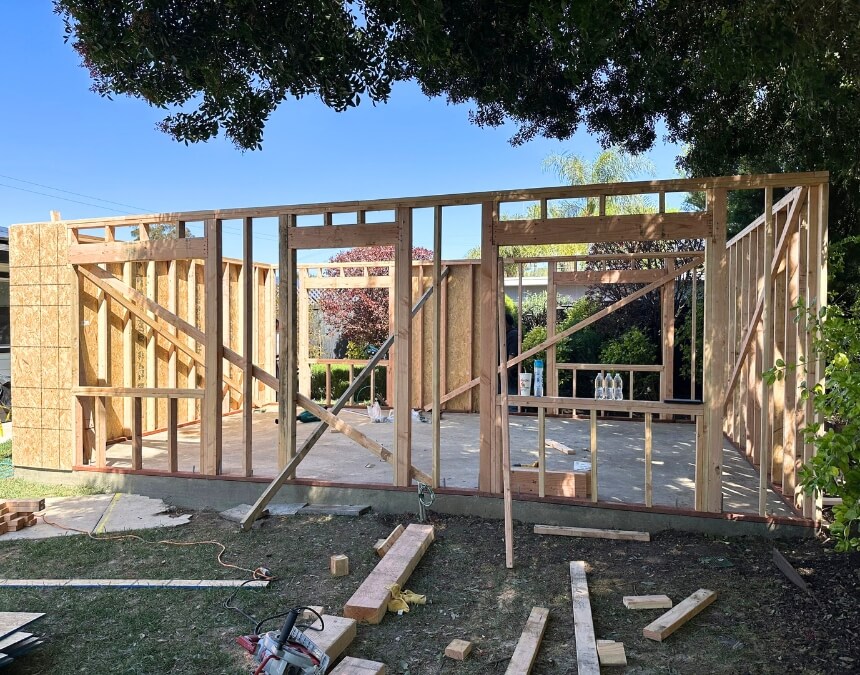 Wood framing and structural sheathing during ADU construction in San Diego — Why Hire a Professional ADU Builder Instead of DIY.