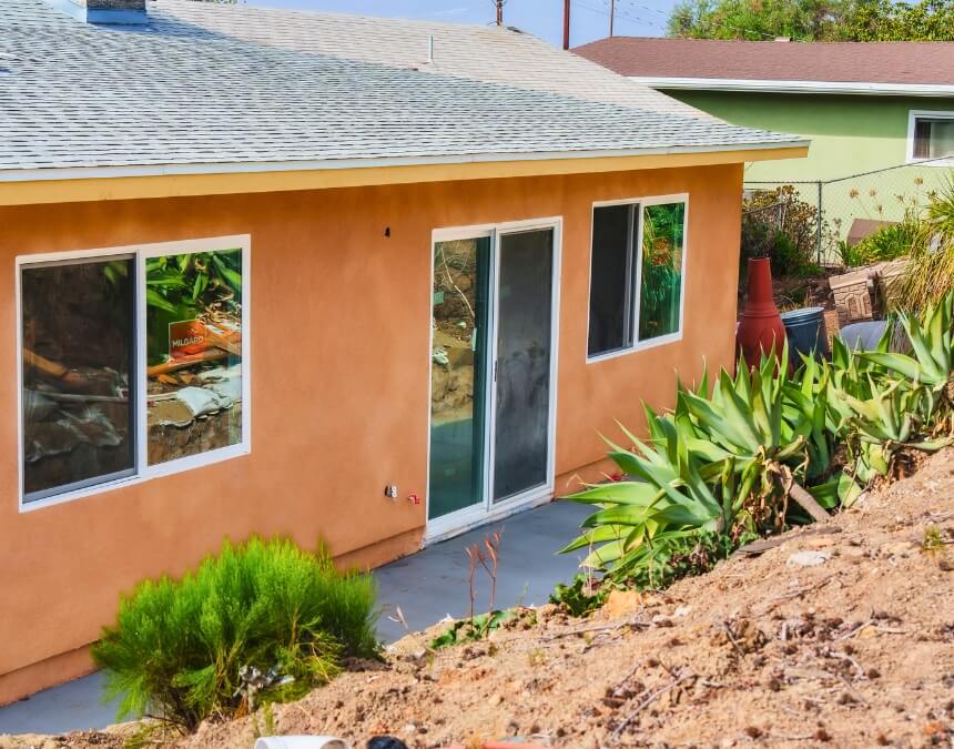 What Is an ADU Builder – completed ADU on a sloped yard demonstrating hillside build expertise.