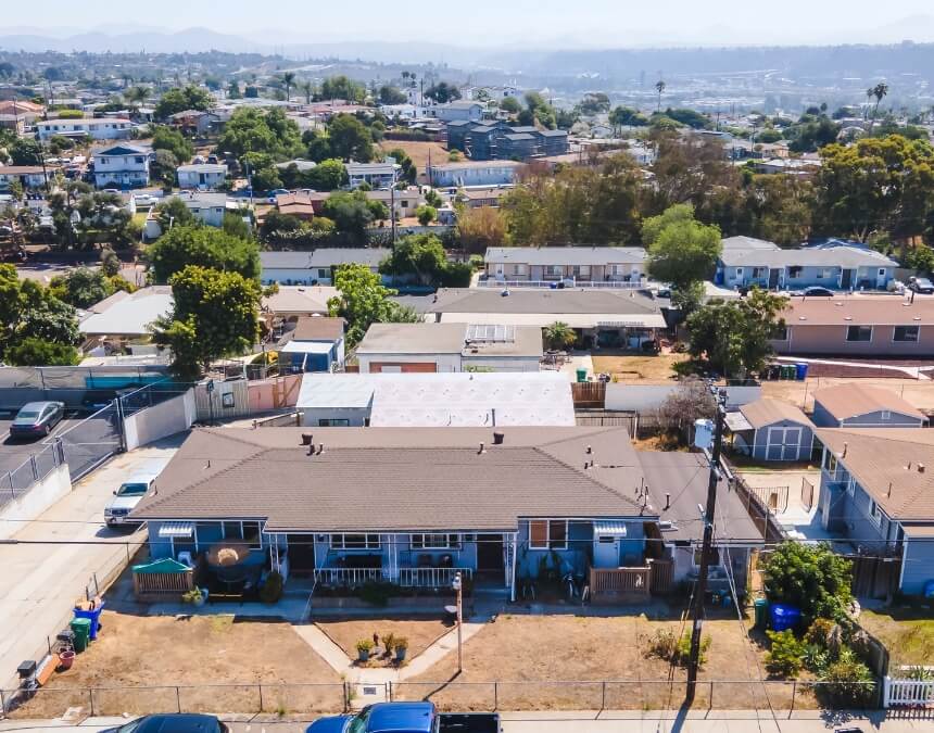 erial neighborhood view illustrating Are There Government Programs, Grants, or Local Incentives for ADU Financing and how local zoning and affordability programs affect ADU feasibility.