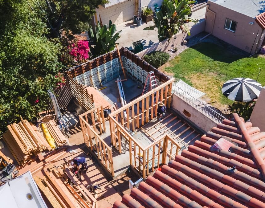 Framing stage of construction for a stacked ADU, highlighting structural and zoning considerations.