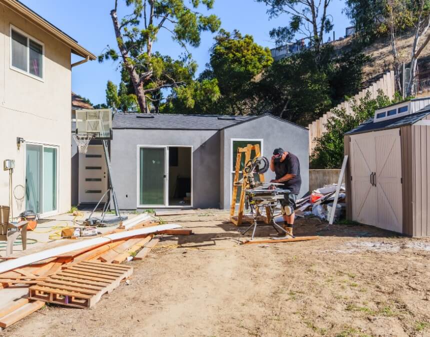 On-site ADU construction in California with framing underway — Prefab vs. Traditional ADU Costs in California section image.