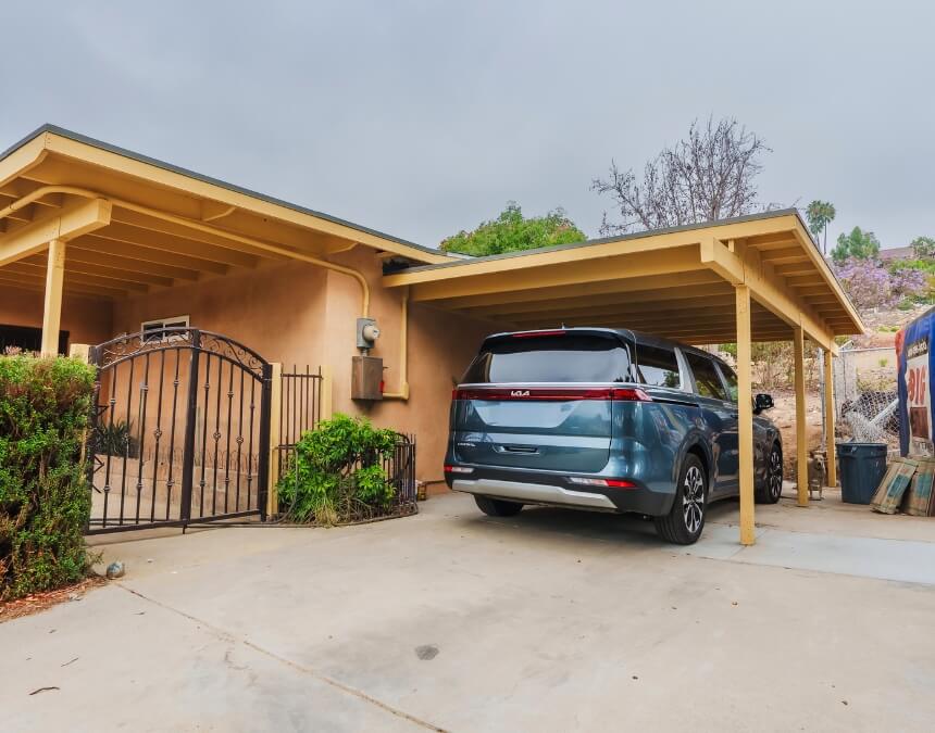 Driveway and carport representing Proximity to Public Transit and Local Amenities for ADU planning in California.