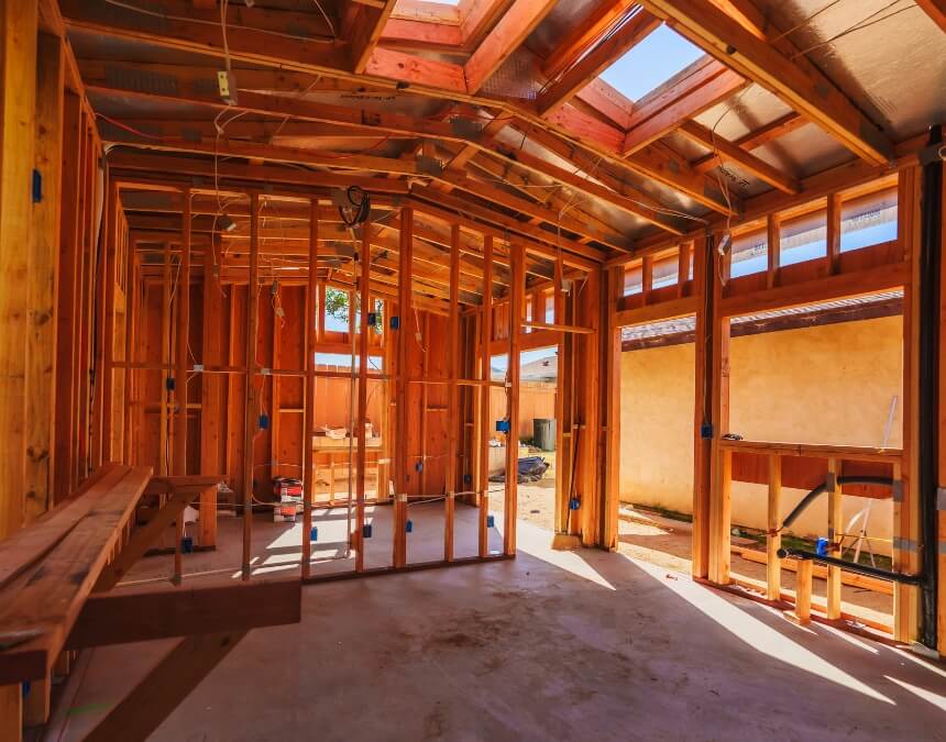 Risk Assessment and Mitigation in ADU construction showing foundation, grading, and site preparation stages