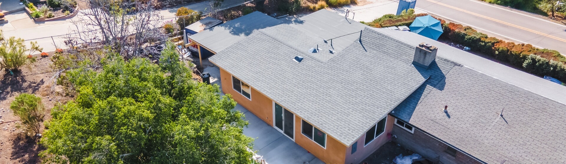 Using a HELOC to Fund an ADU in California – overhead view of a primary residence with an added rear structure footprint suitable for an attached ADU.