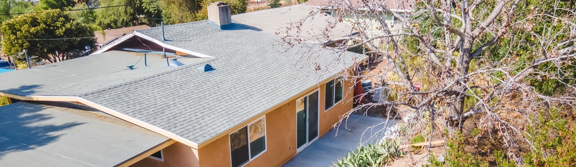 What Roofing Options Are Best for ADUs in California (Especially San Diego) showing a completed backyard ADU with a pitched roof designed for California climate and Title 24 compliance.