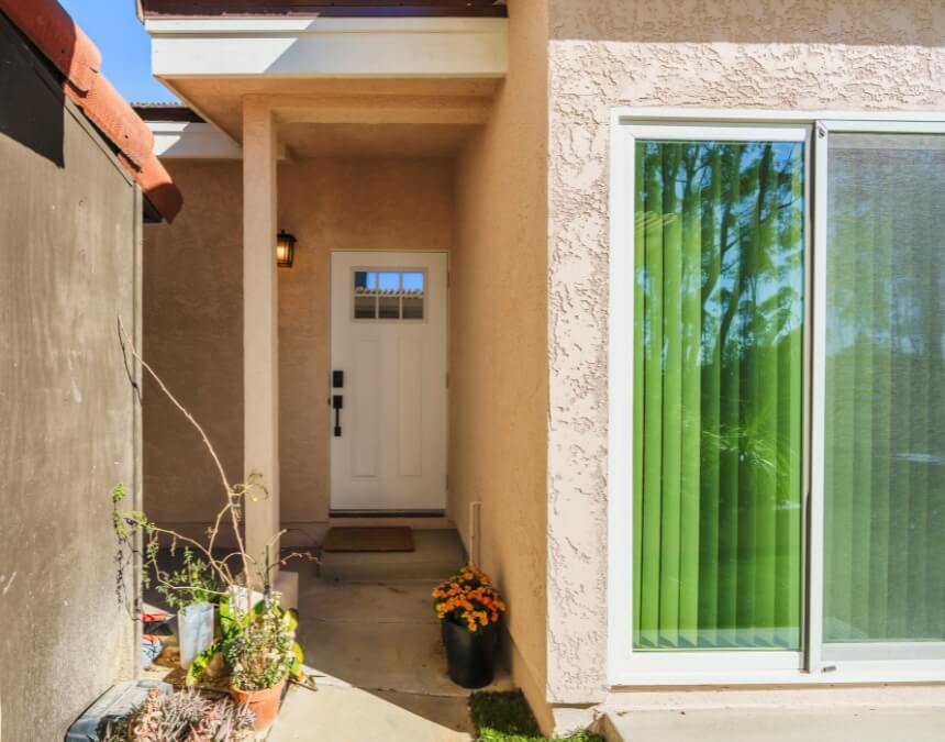 Why HELOCs Are So Popular for ADUs in California – exterior view of a completed backyard ADU entry with private access.