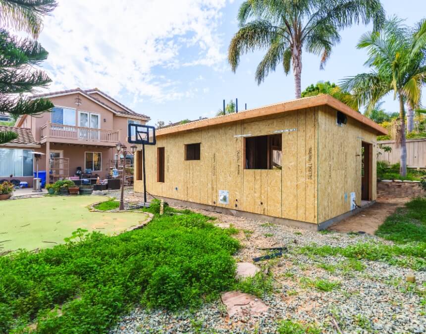 Understanding ADUs A Quick Overview – exterior ADU structure under construction in residential backyard